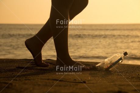 Fair Trade Photo Activity, Barefeet, Beach, Bottle, Coastal, Colour image, Emotions, Evening, Feet, Footstep, Horizontal, Huanchaco, Loneliness, Message, Ocean, Outdoor, People, Peru, Sand, Sea, South America, Sunset, Walking, Water