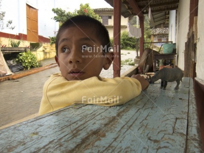 Fair Trade Photo Activity, Colour image, Dailylife, Horizontal, Looking away, Multi-coloured, One boy, Outdoor, People, Perspective, Peru, Playing, Portrait headshot, South America
