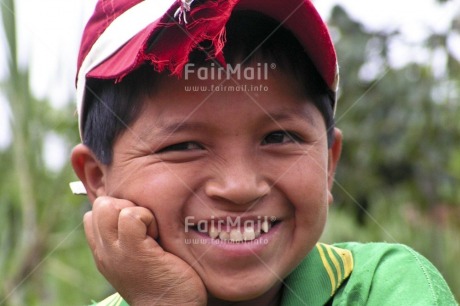 Fair Trade Photo 5-10 years, Activity, Casual clothing, Clothing, Colour image, Day, Emotions, Green, Happiness, Horizontal, Latin, Looking at camera, One boy, Outdoor, People, Peru, Portrait headshot, Red, Smile, Smiling, South America