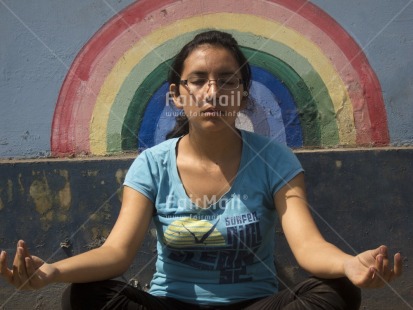 Fair Trade Photo 15-20 years, Activity, Casual clothing, Clothing, Colour image, Horizontal, Latin, Meditating, Multi-coloured, One girl, People, Peru, Sitting, South America, Street, Streetlife