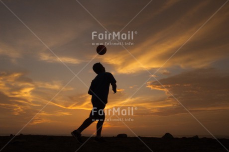 Fair Trade Photo Ball, Clouds, Colour image, Horizontal, One boy, Outdoor, People, Peru, Shooting style, Silhouette, Soccer, South America, Sport