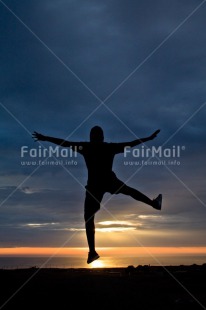 Fair Trade Photo Activity, Beach, Colour image, Colourful, Emotions, Evening, Happiness, Jumping, Light, One man, One person, Outdoor, People, Peru, Shooting style, Silhouette, Sky, South America, Strength, Success, Sun, Sunset, Vertical