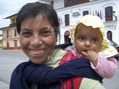 Fair Trade Photo Activity, Baby, Cajamarca, Care, Colour image, Dailylife, Focus on foreground, Horizontal, Looking at camera, Love, Mother, Mothers day, Multi-coloured, One woman, Outdoor, People, Peru, Portrait headshot, South America