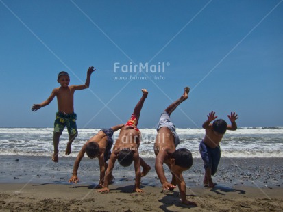 Fair Trade Photo 10-15 years, Activity, Beach, Colour image, Day, Friendship, Group of boys, Group of children, Horizontal, Latin, Outdoor, People, Peru, Playing, Sky, South America, Sport, Summer, Yoga