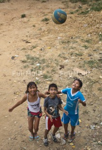 Fair Trade Photo Activity, Ball, Colour image, Emotions, Friendship, Group of children, Happiness, People, Peru, Playing, Rural, Smiling, South America, Together, Vertical