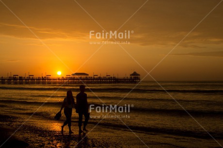 Fair Trade Photo Activity, Beach, Bridge, Coastal, Colour image, Couple, Evening, Holding hands, Horizontal, Huanchaco, Love, Ocean, Outdoor, People, Peru, Sea, Shooting style, Silhouette, South America, Sunset, Two people, Two persons, Walking, Water