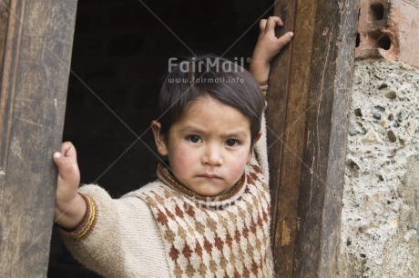 Fair Trade Photo Activity, Colour image, Dailylife, Day, Horizontal, House, Looking at camera, One boy, Outdoor, People, Peru, Portrait halfbody, Rural, South America, Streetlife