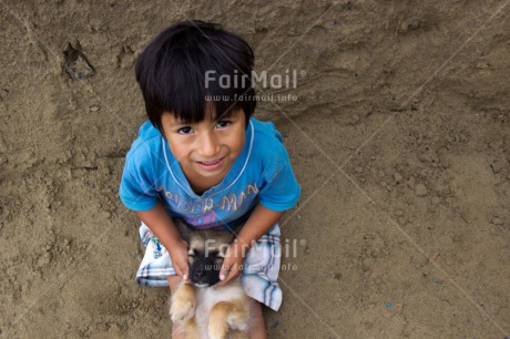 Fair Trade Photo Animals, Care, Colour image, Cute, Day, Friendship, Love, One boy, One dog, Outdoor, People, Peru, Puppy, South America