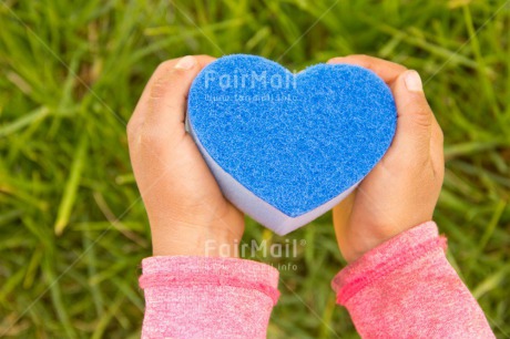 Fair Trade Photo Blue, Child, Colour image, Day, Fathers day, Girl, Grass, Green, Hands, Heart, Horizontal, Love, Mothers day, Nature, Outdoor, People, Peru, South America, Valentines day