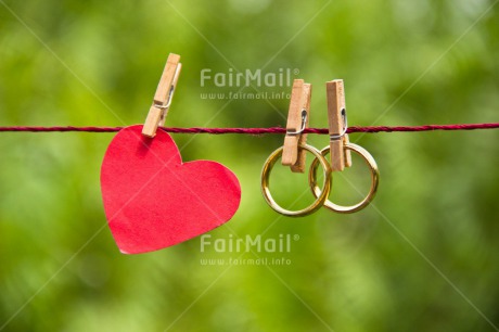 Fair Trade Photo Colour image, Couple, Gold, Green, Hanging, Heart, Horizontal, Love, Marriage, Nature, Outdoor, Peg, Peru, Red, Ring, South America, Together, Two, Wedding