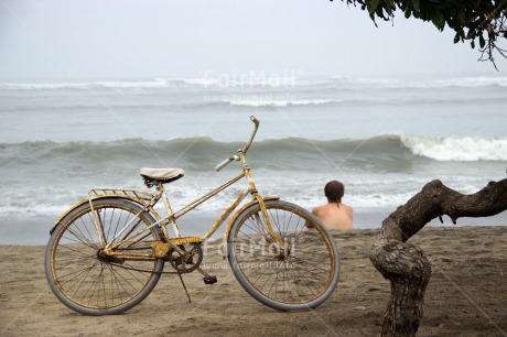 Fair Trade Photo Beach, Bicycle, Colour image, Emotions, Horizontal, Loneliness, One man, People, Peru, Sand, Sea, South America, Transport, Tree