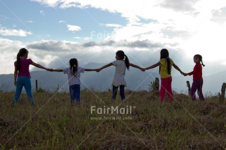 Fair Trade Photo 5 -10 years, Activity, Clouds, Colour image, Evening, Friendship, Group of girls, Holding hands, Latin, Mountain, Outdoor, People, Peru, Rural, Sky, South America, Together