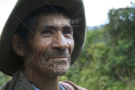 Fair Trade Photo Activity, Brown, Colour image, Green, Horizontal, Looking at camera, Old age, One man, Outdoor, People, Peru, Portrait headshot, Rural, Smile, Smiling, Sombrero, South America, Wisdom