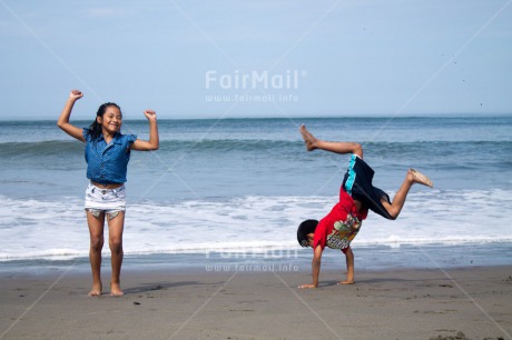 Fair Trade Photo Activity, Beach, Colour image, Cooperation, Emotions, Friendship, Happiness, Horizontal, Love, People, Peru, Playing, Sea, South America, Summer, Together, Two children