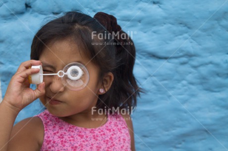 Fair Trade Photo Activity, Colour image, Horizontal, One girl, People, Peru, Playing, Soapbubble, South America