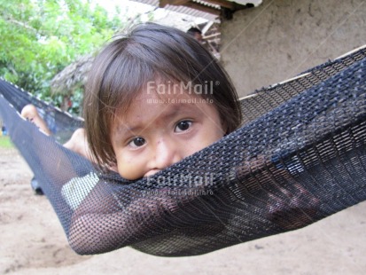 Fair Trade Photo 5-10 years, Activity, Colour image, Cute, Hammock, Horizontal, House, Latin, Lying, Miss you, One girl, People, Peru, Relaxing, Rural, South America, Thinking of you