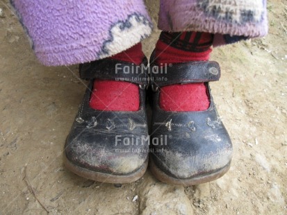 Fair Trade Photo Closeup, Colour image, Horizontal, New baby, One child, One girl, People, Peru, Red, Shoe, South America, Welcome home