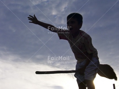 Fair Trade Photo 10-15 years, Activity, Backlit, Colour image, Day, Flying, Funny, Horizontal, One boy, Outdoor, People, Peru, Silhouette, Sky, South America