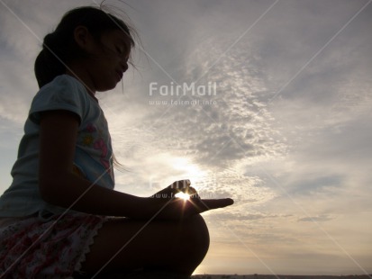 Fair Trade Photo Activity, Clouds, Colour image, Evening, Horizontal, Light, Meditating, One girl, Outdoor, People, Peru, Sitting, Sky, South America, Sunset, Yoga