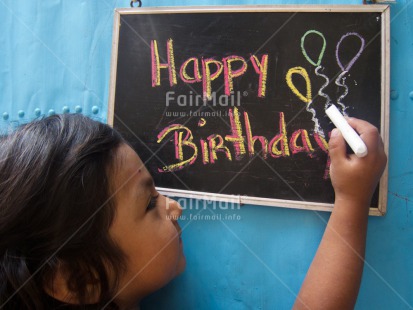 Fair Trade Photo Activity, Balloon, Birthday, Blackboard, Colour image, Hand, Horizontal, Letter, One girl, People, Peru, South America, Writing