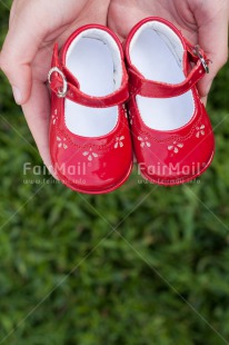 Fair Trade Photo Birth, Colour image, Girl, New baby, People, Peru, Shoe, South America, Vertical