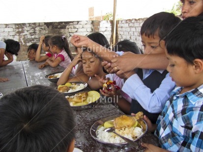 Fair Trade Photo Activity, Colour image, Day, Eating, Education, Food and alimentation, Group of children, Health, Horizontal, Outdoor, People, Peru, Sitting, South America, Together