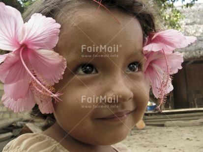 Fair Trade Photo 5 -10 years, Activity, Colour image, Cute, Day, Flower, Horizontal, Latin, Looking away, One girl, Outdoor, People, Peru, Pink, Portrait headshot, Smile, Smiling, South America