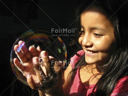 Fair Trade Photo 5-10 years, Artistique, Black, Care, Colour image, Day, Earth, Hope, Horizontal, One girl, Outdoor, People, Peru, Pink, Portrait headshot, Responsibility, Soapbubble, South America, Transparent, Values