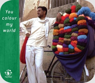 Fair Trade Photo Greeting Card Activity, Asia, Asian, Bicycle, Casual clothing, Clothing, Colour image, Dailylife, Day, Entrepreneurship, Friendship, India, Looking away, Love, Multi-coloured, One man, Outdoor, People, Portrait fullbody, Pride, Selling, Street, Streetlife, Transport, Vertical, Wool