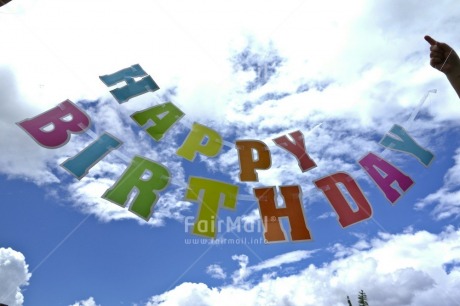 Fair Trade Photo Birthday, Clouds, Colour image, Day, Hand, Horizontal, Letter, Multi-coloured, Outdoor, Peru, Sky, South America