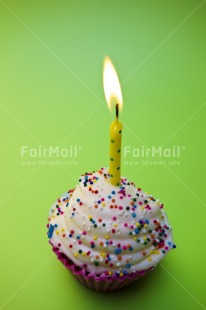Fair Trade Photo Birthday, Cake, Candle, Colour image, Congratulations, Flame, Green, Indoor, Invitation, Party, Peru, South America, Studio, Tabletop, Vertical, Yellow