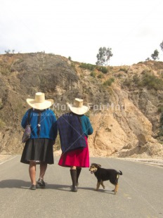 Fair Trade Photo Activity, Clothing, Colour image, Day, Friendship, Latin, Outdoor, People, Peru, Rural, Sombrero, South America, Traditional clothing, Two women, Vertical, Walking