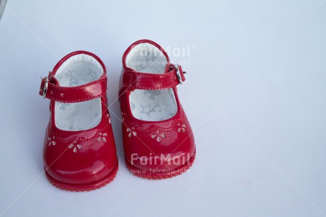 Fair Trade Photo Birth, Closeup, Colour image, Girl, Horizontal, New baby, People, Peru, Red, Shoe, Shooting style, South America