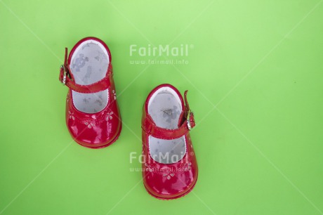 Fair Trade Photo Birth, Closeup, Colour image, Girl, Green, Horizontal, New baby, People, Peru, Red, Shoe, Shooting style, South America
