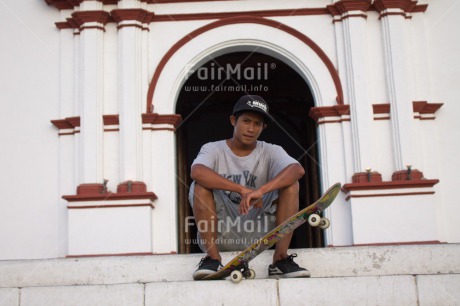 Fair Trade Photo 15-20 years, Activity, Church, Colour image, Horizontal, Latin, Looking at camera, One boy, Outdoor, People, Peru, Skateboard, South America, Sport