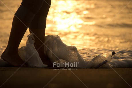 Fair Trade Photo Activity, Barefeet, Beach, Bottle, Coastal, Colour image, Emotions, Evening, Feet, Footstep, Horizontal, Huanchaco, Loneliness, Message, Ocean, Outdoor, People, Peru, Sand, Sea, South America, Sunset, Walking, Water, Wave