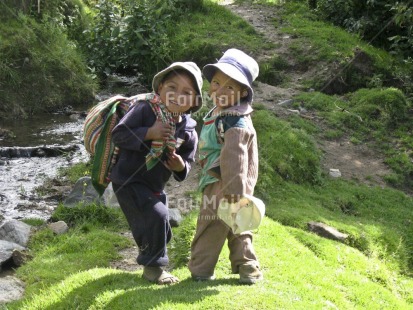 Fair Trade Photo 5-10 years, Activity, Clothing, Colour image, Cute, Day, Emotions, Friendship, Funny, Happiness, Hat, Horizontal, Latin, Looking at camera, Love, Outdoor, People, Peru, Portrait fullbody, River, Rural, Smiling, South America, Travel, Two boys, Water