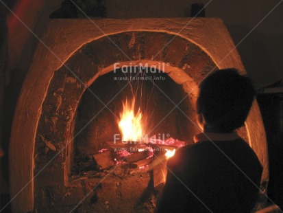 Fair Trade Photo Activity, Colour image, Condolence, Emotions, Evening, Fire, Fireplace, Horizontal, Indoor, Miss you, One boy, People, Peru, Sadness, Sitting, Sorry, South America, Thinking of you