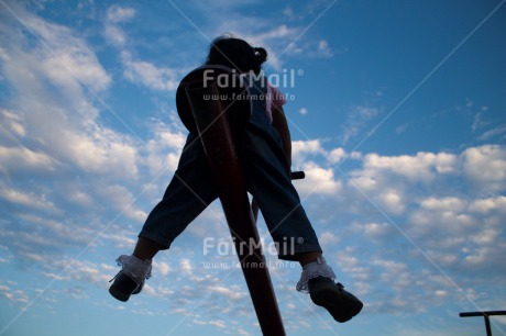 Fair Trade Photo Activity, Backlit, Clouds, Colour image, Emotions, Happiness, One girl, People, Peru, Playground, Playing, Safety, Silhouette, Sky, South America