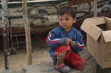 Fair Trade Photo 5 -10 years, Activity, Casual clothing, Child labour, Clothing, Colour image, Dailylife, Latin, Looking away, One boy, People, Peru, Portrait fullbody, South America, Streetlife