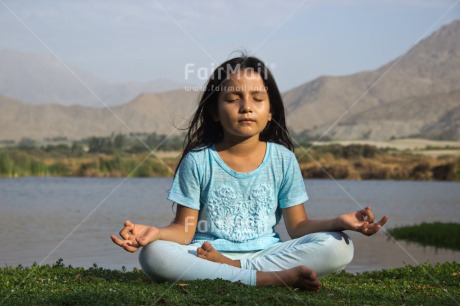 Fair Trade Photo Activity, Colour image, Day, Health, Horizontal, Latin, Meditating, One girl, Outdoor, Peace, People, Peru, South America, Water, Wellness, Yoga