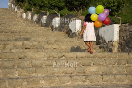 Fair Trade Photo Activity, Balloon, Birthday, Colour image, Confirmation, Day, Growth, Horizontal, One girl, Outdoor, Party, People, Peru, South America, Stairs, Summer, Walking