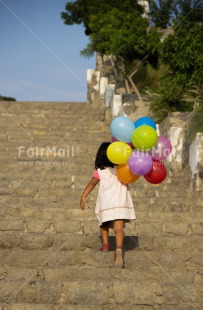 Fair Trade Photo Activity, Balloon, Birthday, Colour image, Confirmation, Day, Growth, One girl, Outdoor, Party, People, Peru, South America, Stairs, Summer, Vertical, Walking