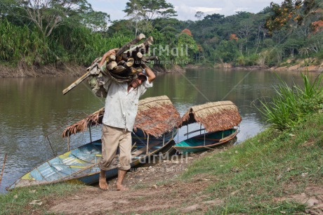 Fair Trade Photo Activity, Boat, Carrying, Colour image, Day, Fair trade, Horizontal, One man, Outdoor, People, Peru, South America, Transport, Wood