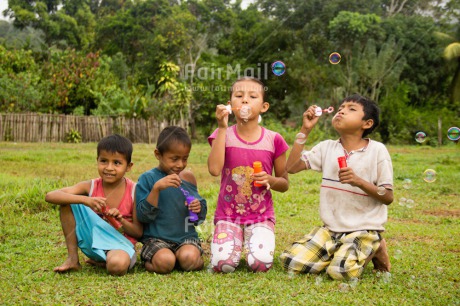 Fair Trade Photo Activity, Colour image, Emotions, Friendship, Group of children, Happiness, Horizontal, Outdoor, People, Peru, Playing, Soapbubble, South America, Summer, Together