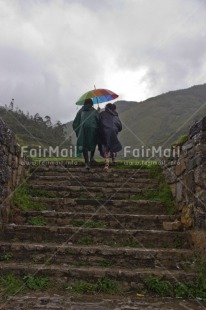 Fair Trade Photo Activity, Colour image, Friendship, Peru, Rain, Rural, Scenic, South America, Together, Umbrella, Vertical, Walking