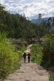 Fair Trade Photo Activity, Colour image, Friendship, Green, Love, Mountain, Outdoor, Peru, Road, Scenic, South America, Together, Travel, Two people, Umbrella, Vertical, Walking