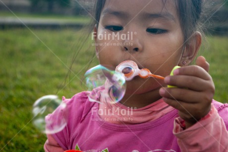 Fair Trade Photo Activity, Colour image, Emotions, Happiness, Horizontal, One girl, People, Peru, Playing, Soapbubble, South America