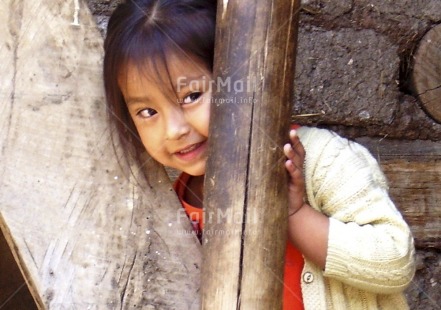 Fair Trade Photo 5-10 years, Activity, Colour image, Cute, Day, Game, Horizontal, Looking at camera, One girl, Outdoor, People, Peru, Portrait halfbody, Rural, Safety, South America
