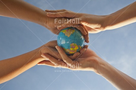 Fair Trade Photo Care, Caucasian, Christmas, Closeup, Colour image, Cooperation, Day, Earth, Environment, Globe, Hand, Horizontal, Integrity, Low angle view, Mountain, Outdoor, Peru, Responsibility, Sky, Snow, South America, Sustainability, Two people, Values, World